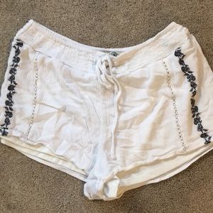 White pair of Harmony+Havoc shorts.
